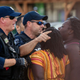 Brittany Martin, center, wearing striped clothing, confronts police as demonstrators in support of George Floyd march with an escort around downtown Sumter, S.C., on May 31, 2020.